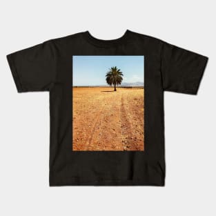 A Palm Tree Standing Alone on Dry Field Kids T-Shirt